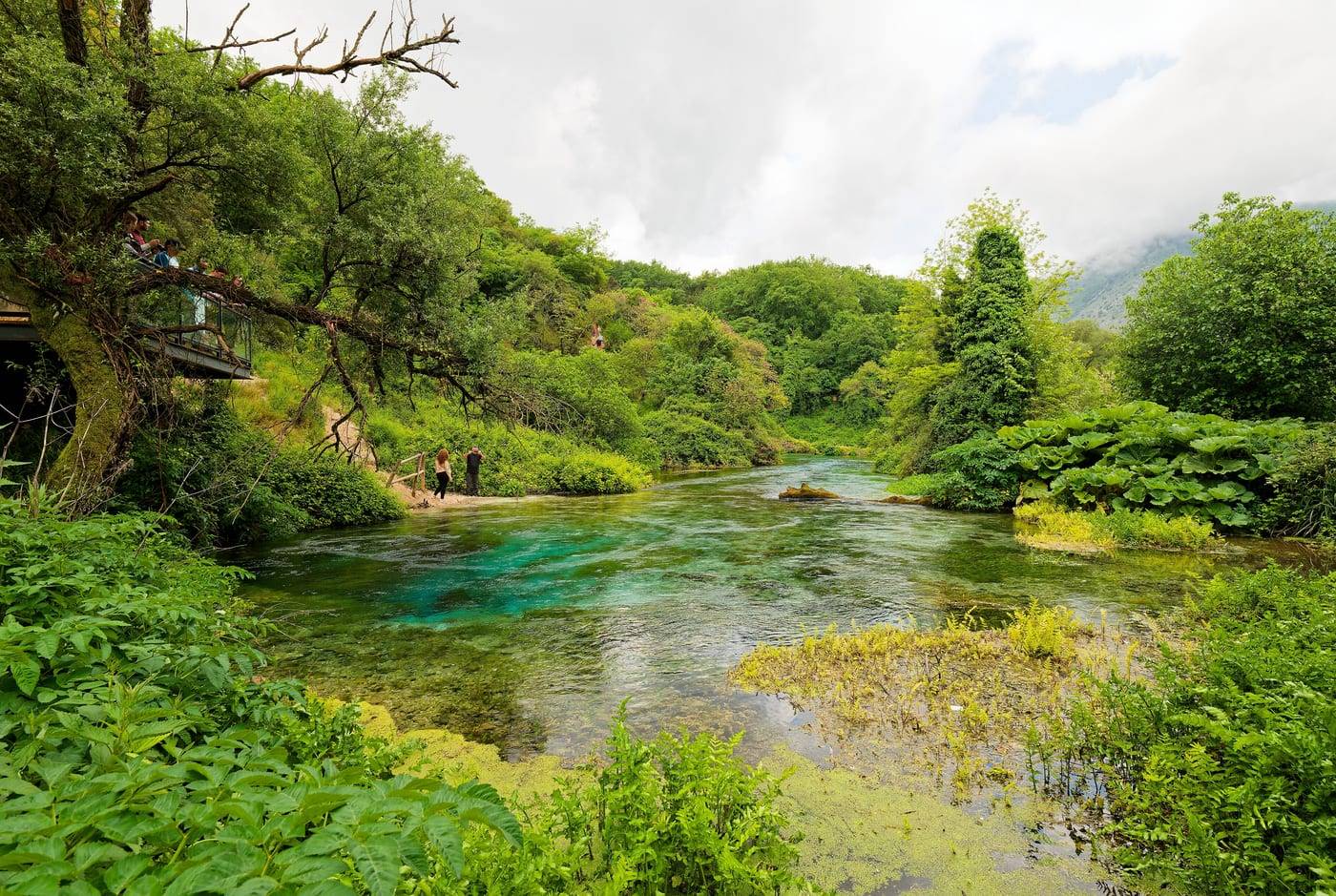 The Blue Eye (Syri i Kaltër): the turquoise spring and its river among lush greenery, inland from Saranda