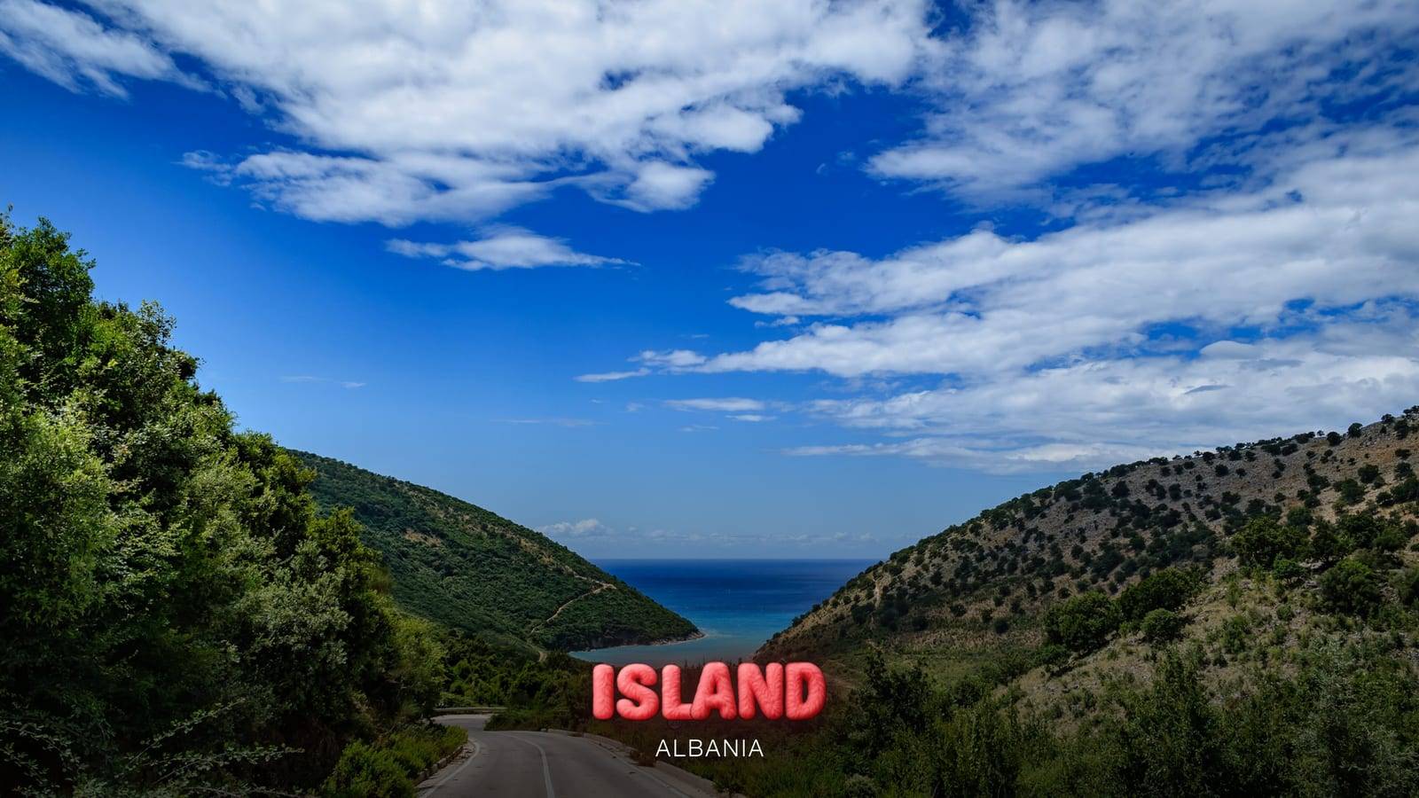 Coastal road near Saranda winding down to a turquoise cove, Albania, with the Party Island Albania logo